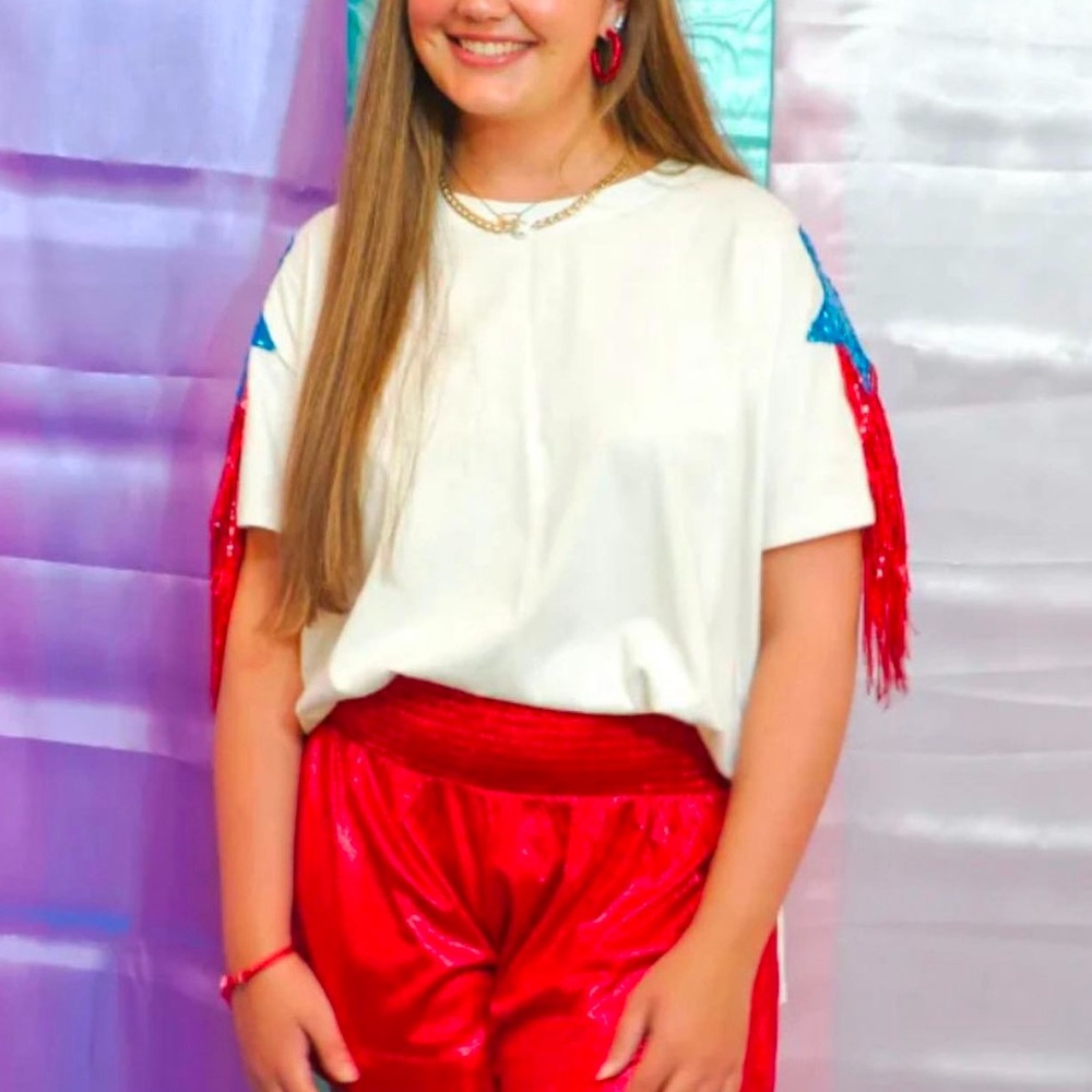 NWT t shirt with sequin star appliqué and tassels